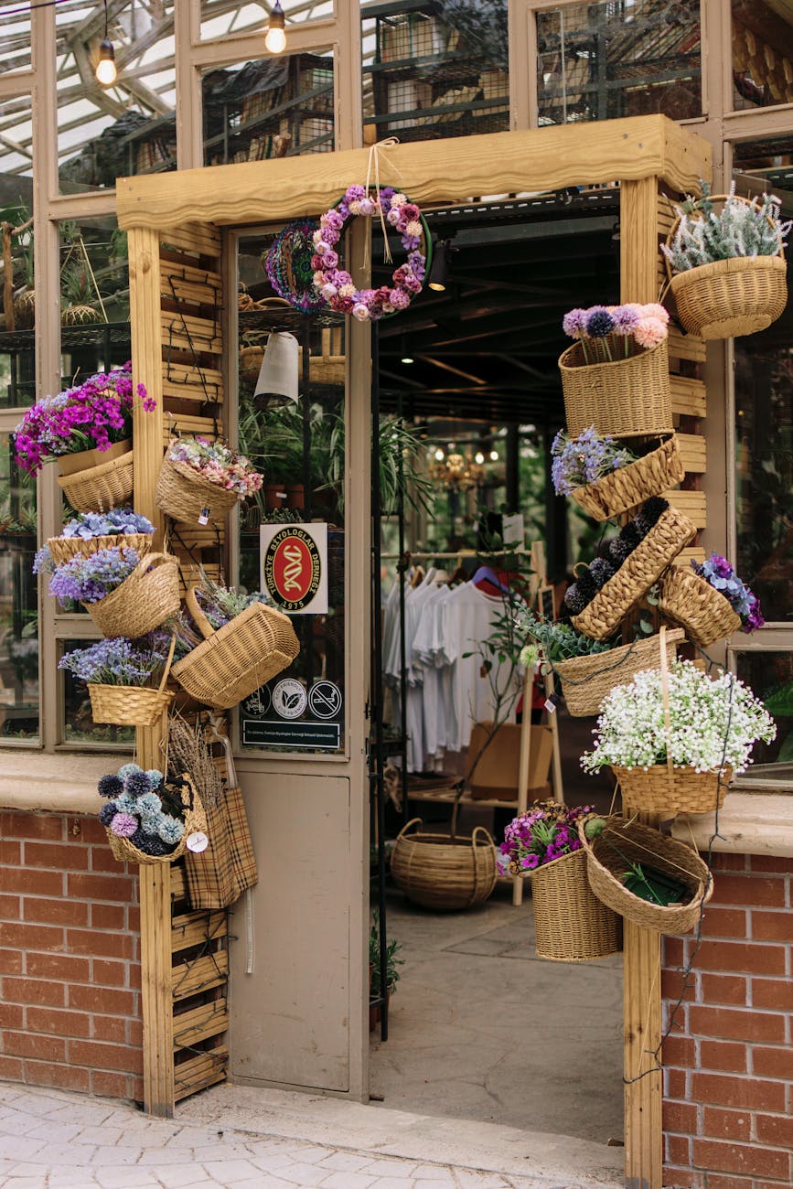 charming floral shop entrance with hanging baskets